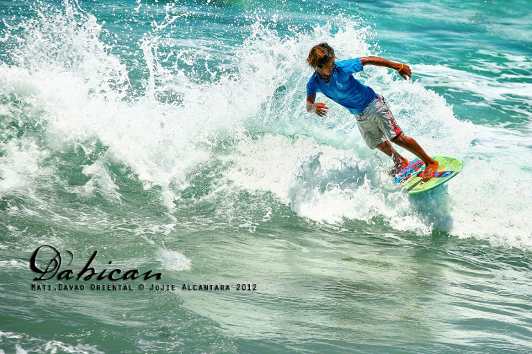 Panggoy playing with the waves in Dahican © Jojie Alcantara